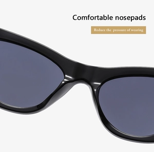 Detail of integrated nose pads on black cat-eye glasses for comfortable wearing