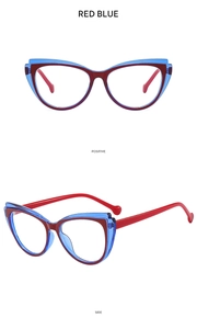 Detail view of cat eye glasses frame in dual-tone red and transparent blue TR90 material