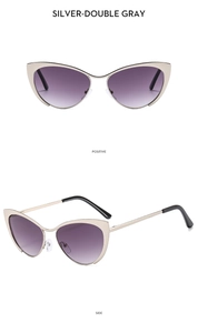Détail de lunettes œil-de-chat argentées anti-lumière bleue avec verres dégradés en métal