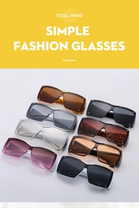 Collection of oversized square Y2K sunglasses in various colors with metal rivets