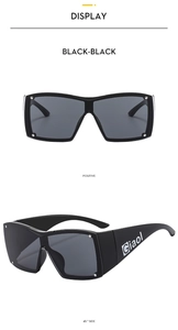 Detail of Y2K square sunglasses showing silver rivets and logo on the temple