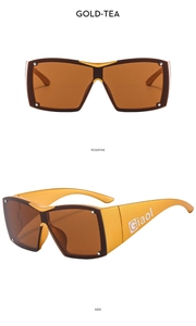 Modern square gold tea sunglasses with integrated nose pads and silver rivet accents