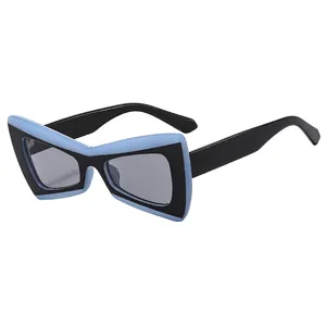 Chic butterfly bow tie shaped sunglasses in blue and black frame with dark grey lenses