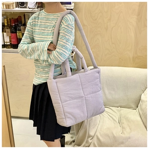 Minimalist quilted tote bag for women, large capacity puffer shoulder bag in light purple.