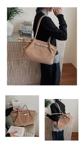 Detail of camel suede bucket bag showing the soft texture and silver metal buckle