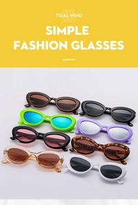 Detailed flat lay of vintage oval sunglasses in various colors with retro frames