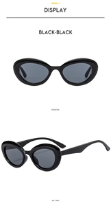 Detailed front and side view of oval cat-eye sunglasses with thick black resin frames