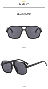 Front and 45-degree side views of black double-bridge pilot sunglasses with silver accents