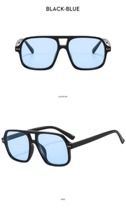 Detail view of black double-bridge pilot sunglasses with light blue lenses from two angles