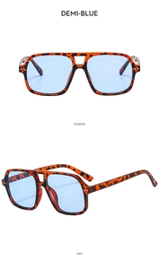 Detail views of tortoise shell double bridge pilot sunglasses with light blue lenses