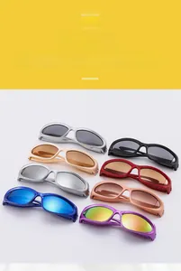Detailed overhead view of various colorful Y2K sports sunglasses for children in many shades