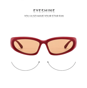 Detail of red Y2K kids sports sunglasses with orange lenses and Eyeshine branding