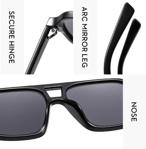 Detail view of reinforced hinge and ergonomic nose pads on black aviator sunglasses