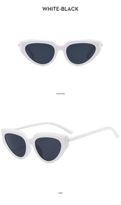 Front and side views of vintage cat eye sunglasses with white frames and black lenses