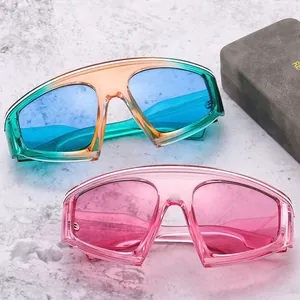 Oversized Y2K sporty sunglasses featuring gradient frames and one-piece shield lenses