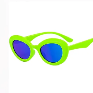 Retro oval cat eye sunglasses with neon green frames and reflective purple lenses