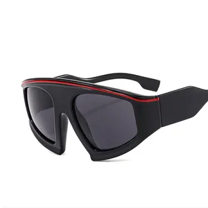 Y2K futuristic oversized sports sunglasses in matte black with a racing red top stripe