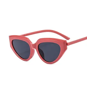 Trendy red cat eye sunglasses with thick plastic frames and dark lenses for women