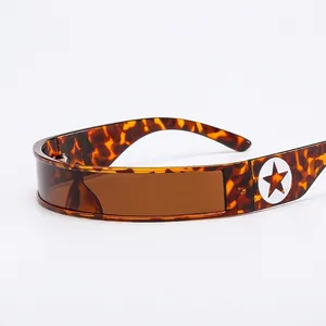 Y2K futuristic shield sunglasses with tortoise frame, tinted lens, and star detail