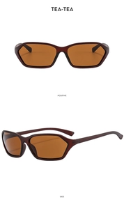 Detail view of irregular hexagon tea-colored Y2K sunglasses from front and side angles