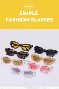 Detailed close-up showing various colors of cat-eye sunglasses with rhinestone stars