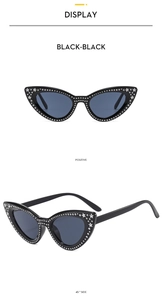 Cat eye sunglasses with silver star studs and black lenses in front and 45 degree views