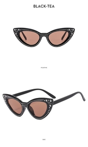 Detailed views of black cat-eye sunglasses with rhinestone stars and tinted tea lenses