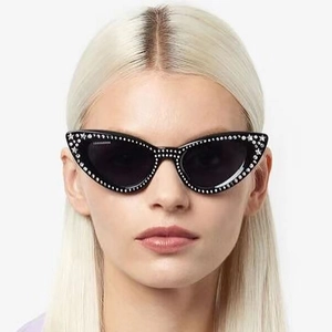 Chic cat eye sunglasses for women with rhinestone star accents and dark lenses