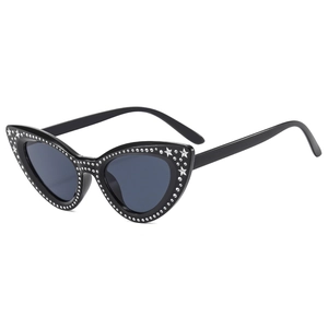 Chic cat eye sunglasses with silver star studs and sleek black frames for women