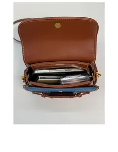 Detailed interior of saddle bag showing large main compartment for essentials