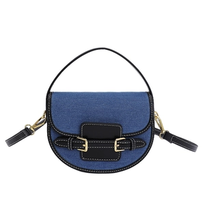 Borsa a sella vintage in denim blu con finiture in pelle nera e fibbie dorate