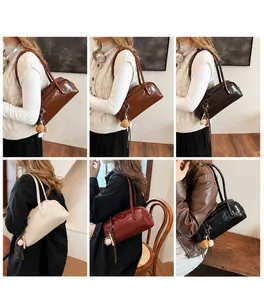 Vintage baguette shoulder bag styled in six colors including brown and wine red