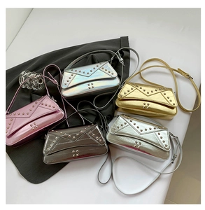 Detailed flat lay of metallic shoulder bags in five colors with rivet decorations