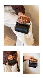 Détail de la poignée créative en peluche baguette et du mini sac cylindre noir élégant