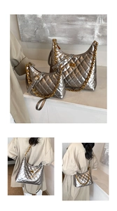Silver quilted saddle bags in two sizes with gold chain straps and metal twist locks