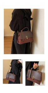 Detail of vintage patchwork handbag featuring gold U-shaped clasp and mixed textures