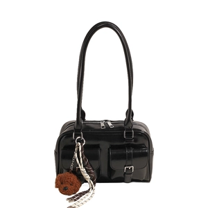 Glossy black patent leather shoulder bag with front pockets and cute teddy pendant