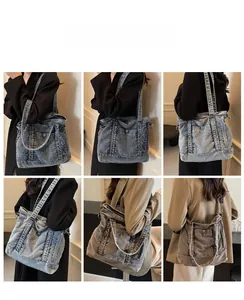 Detail showing vintage denim tote bag features with functional pockets and wash texture