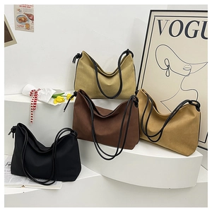 Sacs cabas minimalistes en toile en quatre couleurs avec détails de bandoulière nouée
