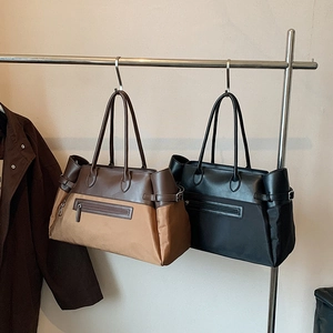 Large nylon contrast tote bag with leather handles and front zipper pocket detail