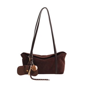 Dark brown suede shoulder bag with baseball charms and matching mini coin purse