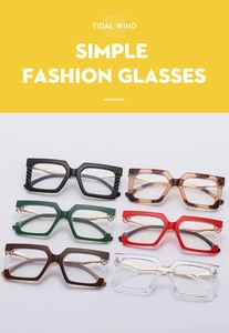 Detail of oversized square anti-blue light glasses with quilted frames and gold wavy temples