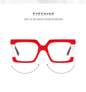 Detail of red square oversized frame with translucent textured temples and hinge craftsmanship