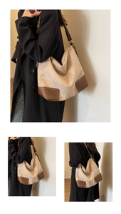 Detailed view of large patchwork suede tote bag with leather corners and adjustable strap