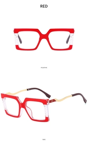 Detail view of red oversized square glasses frame with gold metal temples and side accents