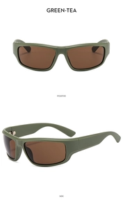 Macro detail of Y2K futuristic matte green sunglasses with dark brown lenses and wide arms