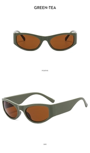 Detail view of Y2K futuristic green tea sunglasses with thick frames and wide temples