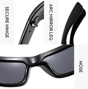 Detail of secure metal hinges and ergonomic arc temples on Y2K sporty sunglasses