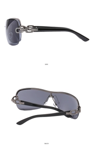 Detail view of Y2K rimless sunglasses featuring silver chain hinges and grey lenses