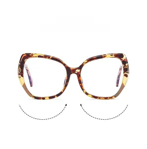 Detailed view of tortoiseshell cat-eye TR90 eyeglass frames with durable metal hinges